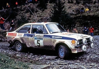 Björn Waldegard - Hans Thorszelius
26º Lombard RAC Rally 1977. Ford Escort RS1800 MKII (WTW 567S). Clasificado 1º.

Del 20 al 24 de Noviembre, London, York, Inglaterra.
Superficie: tierra - asfalto.

El Rally tenia un total de 3069 km de los que 674.45 km divididos en 69 tramos eran especiales, (2 de ellas fueron canceladas SS54 Cardrona de 9,66 Km y SS56 Elibank de 6,44 Km).

Tomaron la salida 182 equipos, finalizaron 67.@
Palabras clave: ;Hans_Thorszelius;Ford;Escort;RS;MKII;Gran_Bretaña;1977;Lombard_RAC_Rally;Inglaterra