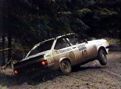 Graham Elsmore - Stuart Harrold
26º Lombard RAC Rally 1977. Ford Escort RS 2000. Clasificado 13º.

Del 20 al 24 de Noviembre, London, York, Inglaterra.
Superficie: asfalto / tierra.

El Rally tenia un total de 3069 km de los que 674.45 km divididos en 69 tramos, eran especiales, (2 de ellas fueron canceladas SS54 Cardrona de 9,66 Km).

Tomaron la salida 180 equipos, finalizaron 67.@
Palabras clave: Ford;Escort;Gran_Bretaña;1977;RAC_Rally