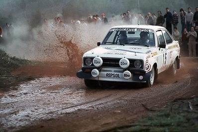 Benigno (Beny) Fernández - Miguel Brasa
11º Rallye de Portugal Vinho do Porto 1977. Ford Escort MKII RS 1800 (PMC 813L). Abandonó por rotura de pernos causando la pérdida de rueda.
Reverter Competition

Del 1 al 6 de Marzo, Estoril.
Superficie: asfalto - tierra.

El Rally tenia un total de 2458 km de los que 580 km divididos en 46 tramos, eran especiales, (2 de ellas fueron canceladas SS18 Sao Lourenco da Montaria de 27 Km y SS 24 Carvalhas de 6 Km).

Tomaron la salida 103 equipos, finalizaron 27.@
Palabras clave: ;Miguel_Brasa;Portugal;1977;Ford;Escort;MKII