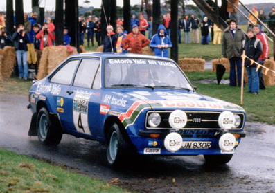 Hannu Mikkola - Arne Hertz
27º Lombard RAC Rally 1978. Ford Escort RS 1800 MKII (SJN 830R). Clasificado 1º.

Del 19 al 23 de Noviembre, Birmingham, Inglaterra.
Superficie: tierra.

El Rally tenia un total de 3160 km de los que 715.37 km divididos en 76 tramos eran especiales.

Se inscribieron 175 equipos, tomaron la salida 168, finalizaron 61.@
Palabras clave: ;Ford;Escort;MKII;Gran_Bretaña;1978;RAC_Rally;Inglaterra