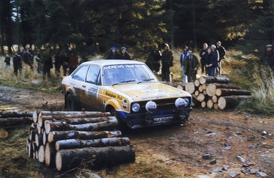 Russell Brookes - Derek Tucker
27º Lombard RAC Rally 1978. Ford Escort RS1800 MKII (UNY 956S). Clasificado 3º.

Del 19 al 23 de Noviembre, Birmingham, Inglaterra.
Superficie: tierra.

El Rally tenia un total de 3160 km de los que 715.37 km divididos en 76 tramos eran especiales.

Se inscribieron 175 equipos, tomaron la salida 168, finalizaron 61.@
Palabras clave: ;Ford;Escort;MKII;Gran_Bretaña;1978;RAC_Rally;Inglaterra