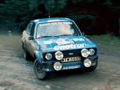 Hannu Mikkola - Arne Hertz
28º Lombard RAC Rally 1979. Ford Escort RS1800 MKII (WTW 569S). Clasificado 1º.

Del 18 al 21 de Noviembre, Chester, Inglaterra.
Superficie: tierra.

El Rally tenia un total de 2.120 km de los que 661.48 km divididos en 59 tramos eran especiales.

Se inscribieron 217 equipos, tomaron la salida 175, finalizaron 74.@
Palabras clave: ;Ford;Escort;Gran_Bretaña;RS1800;MKII;1979