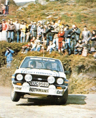 Hannu Mikkola - Arne Hertz
14º Rally de Portugal Vinho do Porto 1980. Ford Escort RS 1800 MKII. Abandonò por accidente en SS25 Cabreira de 26.50 Km.
Como anécdota decir que Vatanen, (compañero de equipo de Mikkola), se saliò en el mismo sitio que Mikkola quedando los dos Fords juntos en el lugar del accidente, uno de ellos volcado y apoyado en el capò trasero del otro.
El Rally tenia un total de 2641.4 km de los que 673.5 km divididos en 47 tramos, eran especiales.
Tomaron la salida 101 equipos, finalizaron 16.@
Palabras clave: ;Ford;Escort;MKII;Portugal;1980