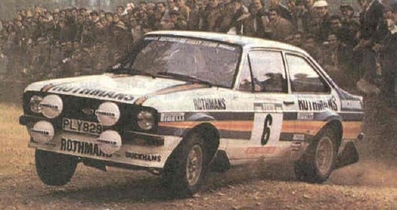 Ari Vatanen - David Richards
15º Rallye de Portugal - Vinho do Porto 1981. Ford Escort RS 1800 MKII (PLY 829W). Abandonó por el eje de transmisión en SS26 Marao de 36 Km.
Rothmans Rally Team

Del 4 al 7 de Marzo, Estoril, Cascais, Lisboa, Portugal.
Superficie: asfalto - tierra.

El Rally tenia un total de 2571.00 km de los que 678.00 km divididos en 46 tramos eran especiales.

Se inscribieron 110 equipos, tomaron la salida 95, finalizaron 24.@
Palabras clave: Ford;Escort;MKII;Portugal;1981