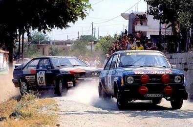 28º Rally Acrópolis 1981
#19 Ford Escort RS 2000 (ZN-6510) de Pavlos Moschoutis - Silef, clasificado 9º.

#20 Audi Quattro (IN-NP 40) de Michèle Mouton - Fabrizia Pons.

Excluida por un sistema que se basaba en que los faros dobles que llevaban los Audi, en uno de ellos, sacaron el vidrio y colocaron una rejilla, así contra mas velocidad, mas aire entraba y mas aspiraba el turbo.

Se retiraron alegando un problema técnico en sus coches, para no ser así­ descalificados del Mundial.
De ésta rodaron cabezas como la de Walter Tresser que fue sustituido por el gran Roland Gumpert.

Del 1 al 4 de Junio, Atenas - Piraeus, Grecia.
Superficie: tierra.

El Rally tenía un total de 2,504.60 km de los que 995.59 km divididos en 57 tramos eran especiales, (2 de ellos fueron cancelados, SS4 Neos Prodromos de 33.02 km y SS35 Mandra de 7.91 km).

Se inscribieron 133 equipos, tomaron la salida 133, finalizaron 22.
@
Palabras clave: Michele_Mouton;Audi;Quattro;Grupo_B;Acropolis;Grecia;1981;Ford;Escort;RS