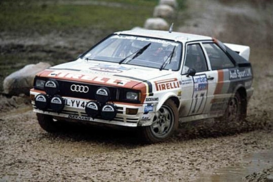 Malcolm Wilson - Mike Greasley
31º Lombard RAC Rally 1982. Audi Quattro (LYV 4X). Clasificado 10º.
Audi Sport UK

Del 21 al 25 de Noviembre, York, Inglaterra.
Superficie: asfalto - tierra.

El Rally tenia un total de 2970.00 km de los que 711.73 km divididos en 69 tramos eran especiales, (una de ellas fue cancelada SS46 Yair de 8.53 Km).

Se inscribieron 161 equipos, tomaron la salida 146, finalizaron 63.@
Palabras clave: Audi;Quattro;Gran_Bretaña;RAC_Rally;1982;Inglaterra