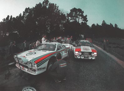 Asistencia del Equipo Martini Racing en el 17º Rallye de Portugal Vinho do Porto 1983
En el Lancia Rally 037 (TO Y67910) de Adartico Vudafieri - Maurizio Perissinot, clasificado 5º.

El Audi Quattro es el A1 (IN-NM 62) de Hannu Mikkola - Arne Hertz, clasificado 1º.

Del 2 al 5 de Marzo, Estoril, Lisboa, Portugal.
Supeficie: asfalto - tierra.

El Rally tenia un total de 2325 km de los que 674.50 km divididos en 43 tramos eran especiales (3 de ellos fueron cancelados SS12 Figueira de Foz de 9 Km, SS13 Prestimo de 12,50 Km, SS14 Vouga de 10 Km).

Tomaron la salida 86 equipos, finalizaron 31.@
Palabras clave: Adartico_Vudafieri;Hannu_Olavi_Mikkola;Audi;Quattro;Lancia;Rally;Grupo_B;Asistencias;Portugal;1983