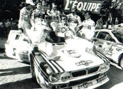 27º Tour de Corse - Rallye de France 1983
Todo el Equipo Martini Racing y alguno de la Jolly Club (Adartico Vudafieri, clasificado 3º), encima del Lancia Rally 037 (TO-Y 88744) de Markku Alén y Ilkka Kivimaki, clasificado 1º.

En la foto podemos ver a:
Attilio Bettega, Adartico Vudafieri, Ilkka Kivimäki, Walter Röhrl, Maurizio Perissinot, Markku Alén, Christian Geistdörfer y Luigi Pirollo. 

Del 5 al 7 de Mayo, Ajaccio, Córcega, Francia.
Superficie: asfalto.

El Rally tenia un total de 1715.10 km de los que 1066.10 km divididos en 32 tramos eran especiales.

Tomaron la salida 178 equipos, finalizaron 57.
@@
Palabras clave: Personajes;Corse;Corcega;1983;Lancia;Rally