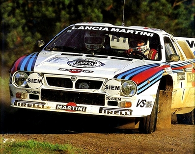 Walter Röhrl - Christian Geistdörfer
13º Sanyo Rally of New Zealand 1983. Lancia Rally 037 (TO X98907). Clasificado 1º.

Éste Rally disputado en su totalidad sobre superficie de grava habi­an 2 especiales con mas de 50 Km, SS11 y SS28, dos de mas de 60 Km, SS13 y SS14, otra de mas de 70 Km, SS30, y una mas, SS19 de 95.09 Km.

Del 25 al 28 de Junio, Auckland, Nueva Zelanda.
Superficie: tierra.

El Rally tenia un total de 2.622 km de los que 1071.09 km divididos en 33 tramos eran especiales.

Tomaron la salida 59 equipos, finalizaron 33.
@
Palabras clave: Walter_Röhrl;Lancia;Rally;Nueva_Zelanda;1983;Grupo_B