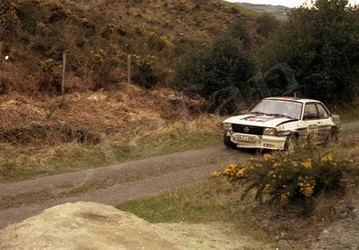 Jimmy McRae - Ian Grindrod
44º Rothmans Circuit of Ireland Rally 1983. Opel Ascona 400 (GG-CJ 690). Clasificado 3º.

Del 1 al 5 de Abril, Belfast, Irlanda del Norte.

El Rally tenia un total de 864.82 Km cronometrados divididos en 5 etapas y 54 tramos eran especiales (2 de ellos fueron cancelados SS34 Glen Ellen de 13.26 km y SS41 Ballybuck de 17.28km).

Tomaron la salida 105 equipos, finalizaron 34.@
Palabras clave: Jimmy_McRae;Opel;Ascona;Grupo_B;Circuit_Ireland;Irlanda;1983