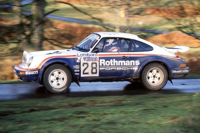Saeed Al-Hajri - John Spiller
33º Lombard RAC Rally 1984. Porsche 911 SC RS (A974 BRX). Clasificado 17º.

Del 25 al 29 de Noviembre, Chester, Cheshire, Inglaterra, Reino Unido.
Superficie: tierra.

El Rally tenia un total de 3232.00 km de los que 868.54 km divididos en 56 tramos eran especiales.

Se inscribieron 124 equipos, tomaron la salida 119, finalizaron 52.@
Palabras clave: ;Porsche;Gran_Bretaña;Grupo_B;1984;RAC_Rally;Inglaterra