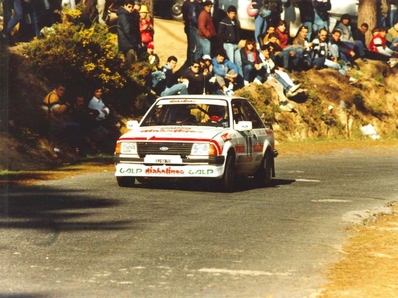 Joaquim Santos - Miguel Oliveira
19º Rallye de Portugal - Vinho do Porto 1985. Ford Escort RS1600i (DJ-80-70). Clasificado 13º.

Del 6 al 9 de Marzo, Estoril, Portugal.
Superficie: asfalto - tierra.

El Rally tení­a un total de 2455 km de los que 730.50 km divididos en 47 tramos eran especiales.

Tomaron la salida 94 equipos, finalizaron 28.@
Palabras clave: Ford;Escort;Portugal;1985