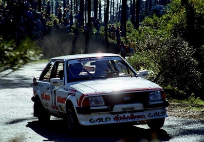 Joaquim Santos - Miguel Oliveira
19º Rallye de Portugal - Vinho do Porto 1985. Ford Escort RS1600i (DJ-80-70). Clasificado 13º.

Del 6 al 9 de Marzo, Estoril, Portugal.
Superficie: asfalto - tierra.

El Rally tení­a un total de 2455 km de los que 730.50 km divididos en 47 tramos eran especiales.

Tomaron la salida 94 equipos, finalizaron 28.@
Palabras clave: Ford;Escort;Portugal;1985