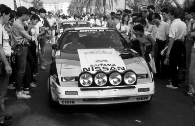 Masaki Kawahara - Masahiko Tanabe
27º Rally Sanremo 1985. Nissan HZ31. Abandonó, desconocemos el motivo y en que especial.

Del 29 de Septiembre al 4 de Octubre, Sanremo, Liguria, Imperia, Italia.
Superficie: asfalto - tierra.

El Rally tenia un total de 2340.56 km, de los que 696.90 km divididos en 45 tramos eran especiales (2 de ellos fueron cancelados SS20 Murio 1 de 9.12 km, SS36 Ronde 1 de 37.22 km).

Tomaron la salida 98 equipos, finalizaron 33.@
Palabras clave: Nissan;HZ31;Sanremo;1985;Parque_Cerrado