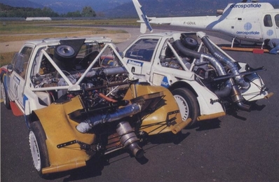 29º Tour de Corse - Rallye de France 1985
Peugeot 205 Turbo 16 E2 & Peugeot 205 Turbo 16

El de la izquierda de la foto es el E2 de Bruno Saby - Jean-François Fauchille. Debutó en este Rally quedando 2º clasificado.

El otro sin E2 es el de Timo Salonen - Seppo Harjanne, abandonó por problemas eléctricos en SS1 Verghia - Pont de la Masina de 38.09 km.

Del 2 al 4 de Mayo, Ajaccio, Córcega, Francia.
Superficie: asfalto.

El Rally tenia un total de 1603.00 km de los que 1122.25 km divididos en 30 tramos eran especiales (1 de ellos fue cancelado, SS5 Sartene - Zonza de 44.23 km, por el fatal accidente de Attilio Bettega en el tramo anterior, SS4 Zerubia - Santa Giulia de 30.60 km).

Tomaron la salida 139 equipos, finalizaron 45.
Palabras clave: ;Peugeot;Turbo;Grupo_B;Corcega;1985;detalles;parque_cerrado;Corse