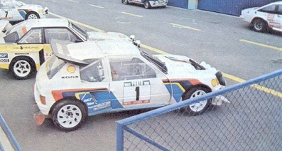 20º Rallye de Portugal Vinho do Porto 1986
En primer plano el Peugeot 205 Turbo 16 E2 de Timo Salonen - Seppo Harjanne, a su lado el Audi Quattro Sport S1 E2 de Walter Röhrl - Christian Geistdörfer, y al final otro Peugeot 205 T16 E2 de Juha Kankkunen - Juha Piironen.

Del 5 al 8 de Marzo, Estoril, Portugal.
Superficie: asfalto - tierra.

El Rallye tenía un total de 2428.47 km de los que 703.50 km divididos en 48 tramos eran especiales.

Todos los equipos "top" abandonan la prueba a causa del fatal accidente de Joaquim Santos y su Ford RS200 donde fallecieron 3 personas y muchas otras resultaron heridas de mayor y menor gravedad.

Todos los pilotos estaban indignados con el comportamiento del público, irresponsable y peligroso.
Hay que decir que habí­a público de todas las nacionalidades, pasó en Portugal como podrí­a haber pasado en cualquier otro Rallye del sur de Europa.

Henri fue quien comunicó a la prensa la unánime decisión de los pilotos.

Nueve tramos especiales fueron cancelados.
Los tres primeros una vez comenzados, (anulando los tiempos de todos los que habían terminado el tramo), SS1 Lagoa Azul 1 de 5.00 km, donde sucedió el accidente, SS2 Peninha1 de 6.50 km, SS3 Sintra 1 de 10.50 km, SS4 Lagoa Azul 2 de 5.00 km, SS5 Peninha 2 de 6.50 km, SS6 Sintra 2 de 10.50 km, SS7 Lagoa Azul 3 de 5.00 km, SS8 Peninha 3 de 6.50 km, SS9 Sintra 3 de 10.50 km.

Tomaron la salida 111 equipos, finalizaron 35.
@
Palabras clave: Timo_Salonen;Peugeot;Audi;Grupo_B;Portugal;1986;Parque_Cerrado