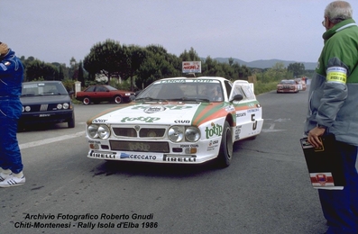 Tiziano Chiti - Arles Montenesi
18º Rallye dell'Isola d'Elba 1986. Lancia Rally 037. Clasificado 5º.

Del 15 al 17 de Mayo, Portoferraio.
Superficie: asfalto - tierra.

Desconocemos de cuantos kilómetros tanto totales como cronometrados constaba la prueba.

Tomaron la salida 61 equipos, finalizaron 25.

Foto de Roberto Gnudi
@
Palabras clave: Lancia;Rally;Grupo_B;Isola_Elba;1986;Parque_Cerrado