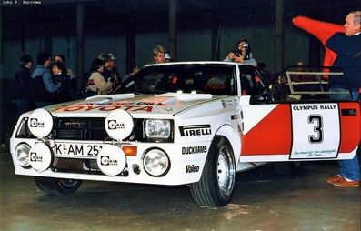 Björn Waldegård - Fred Gallagher
21º Toyota Olympus Rally 1986. Toyota Celica Twincam Turbo (K-AM 2510). Clasificado 5º.

Podemos ver a Böjrn Waldegard junto al coche en las verificaciones técnicas.

Última aparición Oficial de los coches Grupo B en una prueba válida para el Mundial de Rallys.

De 4 al 7 de Diciembre, Tacoma - Tumwater, Washington, Estados Unidos.
Superficie: tierra.

El Rally tenía un total de 540.65 km cronometrados divididos en 40 tramos especiales (uno de ellos fue cancelado SS6 Taylor Towne de 14.76 km).

Tomaron la salida 50 equipos, finalizaron 25.@
Palabras clave: ;Toyota;Celica;TCT;Grupo_B;1986;Personajes