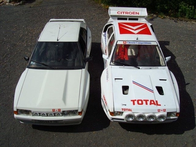 Citröen BX 4TC
1986
Fue un Grupo B fruto de la experiencia adquirida por Citröen en Rallyes con el Citröen Visa GTi y la combinación de soluciones y elementos de otros coches del Grupo PSA. El presupuesto de Citröen para construir un coche de Rally era bastante limitado, lo que se tradujo en un pequeño equipo de ingenieros liderado por Guy Verrier.

El planteamiento del BX 4TC fue sencillo.
En primer lugar se tomó el chasis del Citröen BX de serie y se reforzó con una estructura tubular para darle la rigidez necesaria.
Para contener el peso, las aletas, el capó delantero y el portón trasero fueron fabricados en plástico. También fue dotado de un enorme alerón trasero que finalmente no llegó a las unidades no destinadas a la competición.

Lo que de verdad caracterizó al BX 4TC fue su desmesurado voladizo delantero. Para motorizar el coche, Citröen tomó el bloque Roc de 2.142 c.c. del Peugeot 505 y le instaló una inyección electrónica L-Jetronic Bosch y un turbocompresor KKK tipo K26, potenciándolo hasta los 380 CV. Este motor estaba diseñado para colocarse en posición longitudinal, y el BX estaba pensado para montar motores transversales, lo que obligó a los ingenieros a alargar el capó nada menos que 28 cm. Si a este alargamiento le añadimos que para mejorar la maniobrabilidad se acortó la distancia entre ejes 40 mm, nos encontramos con un anti-estético voladizo delantero.
Pero los problemas de implantación del bloque Roc no acabaron aquí­. Su gran altura debida a la instalación del Turbo en la parte superior obligó a colocarlo inclinado 15º hacia la derecha y a realizar un importante resalte en la tapa del capó, en la que además se incluyeron unas rejillas para la refrigeración de las esferas de la suspensión hidroneumática.

Por aquel entonces, todo Grupo B que se preciase debía tener tracción integral, hubo sistemas muy sofisticados como los del Audi S1 E2, pero el escaso presupuesto de Citröen obligó al equipo de diseño a improvisar.

El BX era originalmente un coche de tracción delantera, y para conseguir la tracción integral se le acopló el puente trasero del Peugeot 505 sin ningún tipo de diferencial intermedio, aunque sí­ con un sistema que permitía optar por tracción delantera o integral, pudiéndose hacer el cambio entre estas en marcha. La transmisión se complementó con una caja de cambios derivada del Citröen SM de los años 70 que también utilizó el Peugeot 205 T16.

En la versión básica que llegó a los consumidores (eran necesarias 200 unidades de calle para homologar la versión 4TC Evo), al motor Roc se le sustituyó el turbo KKK por un turbo Garret asistido por un compresor situado por encima de él y movido eléctricamente.
La potencia alcanzaba los 200 CV a 5.250 rpm, con un par máximo de 30 kg.m. a 2.750 rpm. A pesar de tratarse de un coche de Rally, el Citröen BX 4TC mantenía el carácter familiar que le imponían sus 5 puertas y un maletero muy utilizable, y permitía viajar a cuatro o cinco personas cómodamente siempre que ignorasen el estruendo producido por su motor.

La abolición del Grupo B unida a la escasa efectividad del vehículo (participó en 15 rallyes, de los cuales sólo 3 fueron puntuables para el Campeonato Mundial y abandonó en 13 ocasiones) convirtieron en un fiasco la aventura de Citröen en el Grupo B.

FICHA TÉCNICA

Motor tipo
Delantero longitudinal de 4 cilindros en línea.

Cilindrada
2.142 c.c.

Diámetro x carrera
91,4 x 81,6 mm

Alimentación
Inyección electrónica L-Jetronic Bosch y un turbocompresor KKK tipo K26

Par máximo
46 kg.m a 5.500 rpm

Potencia máxima
380 CV a 7.000 rpm

TRANSMISIÓN

Tipo
Tracción integral (puente trasero desacoplable)

Cambio
Manual de 5 relaciones

Información conseguida de http://motormania.info
Palabras clave: Citroen;Grupo_B;1986