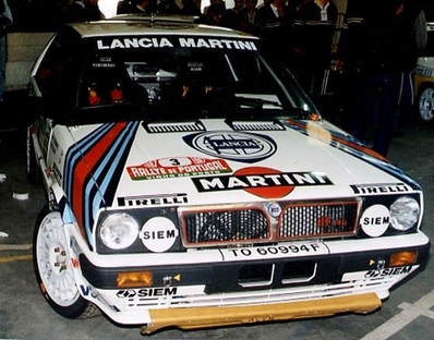 Markku Alén - Ilkka Kivimaki
Markku Alén - Ilkka Kivimaki
21º Rallye de Portugal Vinho do Porto 1987. Lancia Delta HF 4WD, (TO 60994F). Clasificado 1º.

Del 11 al 14 de Marzo, Estoril, Cascais, Lisboa, Portugal.
Superficie: asfalto - tierra.

El Rally tenia un total de 2,088.23 Km de los que 603.50 Km divididos en 37 tramos, eran especiales.

Tomaron la salida 94 equipos, finalizaron 36.@
Palabras clave: Markku_Alen;Lancia;Delta;Portugal;1987;Parque_Cerrado