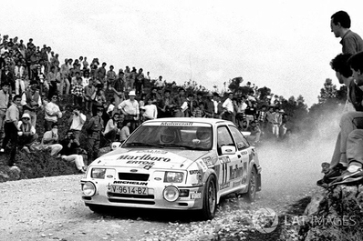 Carlos Sainz Cenamor - Antonio Boto
21º Rallye de Portugal Vinho do Porto 1987. Ford Sierra RS Cosworth (V-9614-BZ). Abandonó por el turbo en SS8 Freita de 24.20 Km

En su debut en una prueba del Mundial consiguieron 2 scratch, por delante de tracciones total como las de Markku Alén, Miki Biasion o Juha Kankkunen con los Lancia Delta HF 4WD.
SS1 Estoril de 13.10 Km (6' 27" a una media de 121.86 km/h) colocándose lideres de la prueba, y en SS6 Prestimo de 12.20 km (7' 57" a una media de 92.08 km/h).

Del 11 al 14 de Marzo, Estoril, Cascais, Lisboa, Portugal.
Superficie: asfalto - tierra.

El Rally tenia un total de 2,088.23 Km de los que 603.50 Km divididos en 37 tramos, eran especiales.

Tomaron la salida 94 equipos, finalizaron 36.
@
Palabras clave: ;Ford;Sierra;Cosworth;Portugal;1987