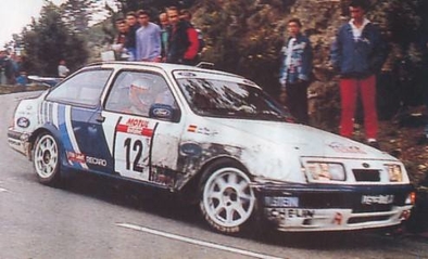 Carlos Sainz Cenamor - Luis Moya
32º Tour de Corse - Rallye de France 1988. Ford Sierra RS Cosworth (D323 TVW). Clasificado 5º.

Del 3 al 6 de Mayo, Ajaccio, Córcega, Francia.
Superficie: asfalto.

El Rally tenia un total de 1333.00 km de los que 622.84 km divididos en 30 tramos eran especiales.

Se inscribieron 93 equipos, tomaron la salida 93, finalizaron 42.@
Palabras clave: ;Luis_Moya;Ford;Sierra;RS;Cosworth;Còrcega;1988;Corse