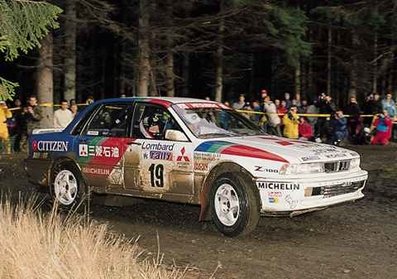 Pentti Airikkala - Ronan McNamee
38º Lombard RAC Rally 1989. Mitsubishi Galant VR-4. Clasificado 1º.
El Rally tenia un total de 3,081.99 Km de los que 603.57 Km divididos en 55 tramos eran especiales.
Se inscribieron 202 equipos, tomaron la salida 187, finalizaron 84.@
Palabras clave: Pentti_Airikkala;Mitsubishi;Galant;Gran_Bretaña;1989;RAC_Rally