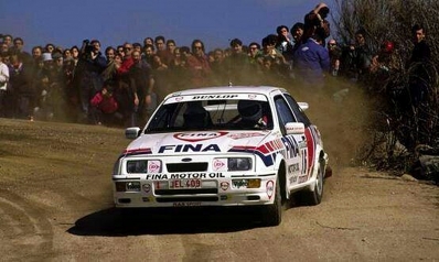 Marc Duez - Alain Lopes
24º Rallye de Portugal Vinho do Porto 1990. Ford Sierra RS Cosworth (JEL-409). Clasificado 8º.
Ford Fina Rally Team

Del 6 al 10 de Marzo, Estoril, Cascais, Lisboa, Portugal.
Superficie: asfalto - tierra.

El Rally tenia un total de 2047.51 Km de los que 556.10 km Km divididos en 39 tramos eran especiales, (uno de ellos fue cancelado SS11 Prestimo de 11.90 Km).

Se inscribieron 108 equipos, tomaron la salida 100, finalizaron 34.@
Palabras clave: Ford;Sierra;Cosworth;Portugal;1990