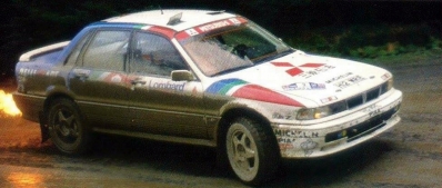 Kenneth Eriksson - Staffan Parmander
47º Lombard RAC Rally 1991. Mitsubishi Galant VR-4 (H12 MRE). Clasificado 2º.

Del 24 al 28 de Noviembre, Harrogate, Yorkshire, Inglaterra.
Superficie: tierra.

El Rally tenia un total de 2355.31 Km de los que 565,51 Km divididos en 37 tramos eran especiales.

Se inscribieron 160 equipos, tomaron la salida 151, finalizaron 82.@
Palabras clave: ;Mitsubishi;Galant;VR-4;Gran_Bretaña;RAC_Rally;Lombard;1991