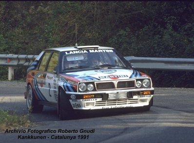 Juha Kankkunen - Juha Piironen
27º Rallye España - Catalunya Costa Brava 1991. Lancia Delta Integrale 16V (TO 76856R). Clasificado 2º.

Primer año válido para el Campeonato Mundial de Rallyes.

Del 10 al 13 de Noviembre, Lloret de Mar, Girona, Catalunya, España.
Superficie: asfalto - tierra.

El Rally tenia un total de 1606.98 km de los que 594.01 km divididos en 35 tramos eran especiales, (2 de ellos fueron cancelados SS4 Sant Hilari - Osor de 13.57 Km y SS29 Riera de Merles de 14.36 Km).

Tomaron la salida 76 equipos, finalizaron 33.

© Roberto Gnudi
@
Palabras clave: Juha_Kankkunen;Juha_Piironen;Lancia;Delta;Integrale;Catalunya;Costa_Brava;1991;Spain;España