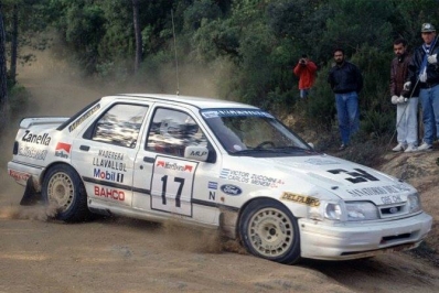 Carlos Menem Jr. - Victor H. Zucchini
27º Rallye España - Catalunya Costa Brava 1991. Ford Sierra Cosworth 4x4 (G95 CHK). clasificado 11º.

Del 10 al 13 de Noviembre, Lloret de Mar, Girona, Catalunya, España.
Superficie: asfalto - tierra.

El Rally tenia un total de 1606.98 km de los que 594.01 km divididos en 35 tramos eran especiales, (2 de ellas fueron canceladas SS4 Sant Hilari - Osor de 13.57 Km y SS29 Riera de Merles de 14.36 Km).

Tomaron la salida 76 equipos, finalizaron 33.@
Palabras clave: Menem;Ford;Sierra;Cosworth;Catalunya;Costa_Brava;1991