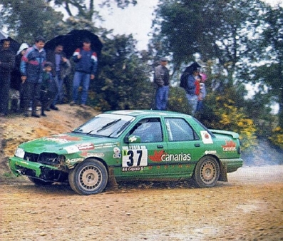 Fernando Capdevila - Alfredo RodrIguez
25º Rallye de Portugal - Vinho do Porto 1991. Ford Sierra RS Cosworth 4x4 (10 MPE). Clasificado 13º.

Del 5 al 9 de Marzo, Portugal.
Superficie: asfalto - tierra.

El Rally tenia un total de 2041.26 Km de los que 564.20 Km divididos en 38 tramos eran especiales (2 de ellos fueron cancelados SS2 Gradil de 9 Km y SS28 Viseu de 29.90 Km).

Se inscribieron 106 equipos, tomaron la salida 95, finalizaron 28.@
Palabras clave: Ford;Sierra;Cosworth;Portugal;1991