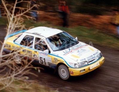 Jeremy Easson - Alun Cook
47º Lombard RAC Rally 1991. Ford Sierra RS Cosworth 4x4 (G400 VRD). Clasificado 19º.

Del 24 al 28 de Noviembre, Harrogate, Yorkshire, Inglaterra.
Superficie: tierra.

El Rally tenia un total de 2355.31 Km de los que 565,51 Km divididos en 37 tramos eran especiales.

Se inscribieron 160 equipos, tomaron la salida 151, finalizaron 82.@
Palabras clave: Ford;Sierra;RS;Cosworth;Gran_Bretaña;RAC_Rally;Lombard;1991