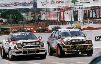 39º Martini Safari Rally Kenya 1991
Lancia Delta HF Integrale 16v y Toyota Celica GT-4 (ST165)

#6 Lancia (TO 22602R) de Juha Kankkunen - Juha Piironen, clasificado 1º.

#4 Toyota (K-AM 3761) de Mikael Ericsson - Claes Billstam, clasificado 2º.

Del 27 de Marzo al 1 de Abril, Nairobi, Kenya, África.
Superficie: tierra.

El Rally tenia un total de 4520.76 km con 79 controles horarios.

Tomaron la salida 57 equipos, finalizaron 27.@
Palabras clave: Lancia;Delta;Integrale;Toyota;Celica;ST165;Safari;Parque_Cerrado;1991