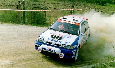 François Chatriot - Michel Perin
26º Rallye de Portugal - Vinho do Porto 1992. Nissan Sunny GTI-R (J1 NME). Clasificado 6º.
Nissan Motorsports Europe

Del 3 al 7 de Marzo, Portugal.
Superficie: tierra.

El Rally tenia un total de 2211.17 km de los que 577.38 km divididos en 40 tramos, eran especiales.

Se inscribieron 114 equipos, tomaron la salida 100, finalizaron 31.

PHOTO António Teixeira
@
Palabras clave: Nissan;Sunny;Portugal;1992