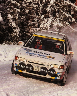 Björn (Nalle) Johansson - Anders Olsson
41º International Suecia Rally 1992. Mazda 323 GT-X (323 4WD). Clasificado 7º.

Del 12 al 17 de Febrero, Karlstad, Suecia.
Superficie: nieve - hielo. 

El Rally tenia un total de 1673.00 Km de los que 571.19 Km divididos en 31 tramos eran especiales.

Se inscribieron 94 equipos, tomaron la salida 94, finalizaron 46.@
Palabras clave: Mazda;Suecia;1992;nieve