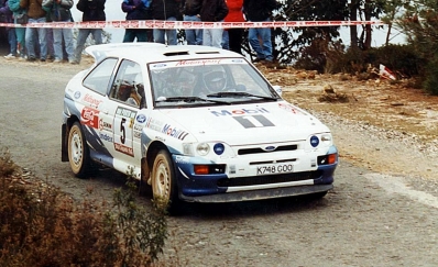 François Delecour - Daniel Grataloup
27º Rallye de Portugal - Vinho do Porto 1993. Ford Escort RS Cosworth (K748 GOO). Clasificado 1º.

Del 3 al 6 de Marzo, Portugal.
Superficie: asfalto - tierra.

El Rally tenia un total de 2164.91 km de los que 576.13 km divididos en 38 tramos eran especiales (una de ellas fue cancelada SS10 Caramulo de 14.08 Km).

Se inscribieron 90 equipos, tomaron la salida 84, finalizaron 32.@
Palabras clave: ;Ford;Escort;RS;Cosworth;Portugal;1993