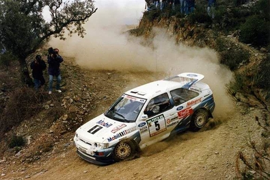 François Delecour - Daniel Grataloup
27º Rallye de Portugal - Vinho do Porto 1993. Ford Escort RS Cosworth (K748 GOO). Clasificado 1º.

Del 3 al 6 de Marzo, Portugal.
Superficie: asfalto - tierra.

El Rally tenia un total de 2164.91 km de los que 576.13 km divididos en 38 tramos eran especiales, (uno de ellos fue cancelado SS10 Caramulo de 14.08 Km).

Se inscribieron 90 equipos, tomaron la salida 84, finalizaron 32.@
Palabras clave: ;Portugal;Ford;Escort;Cosworth;1993