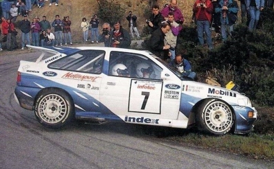 Massimo (Miki) Biasion - Tiziano Siviero
37º Tour de Corse - Rallye de France 1993. Ford Escort RS Cosworth (K831 HHJ). Clasificado 7º.
Ford Motor Co. Ltd.

Del 1 al 5 de Mayo, Ajaccio, Córcega, Francia.
Superficie: asfalto.

El Rally tenia un total de 1,130.95 Km de los que 556.42 Km divididos en 24 tramos eran especiales.

Se inscribieron 92 equipos, tomaron la salida 85, finalizaron 44.@
Palabras clave: Ford;Escort;Cosworth;RS;Corse;Corcega;1993