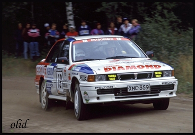 Jouko Puhakka - Keijo Eerola
43º 1000 Lakes Rally 1993. Mitsubishi Galant VR-4 (XMC 359). Clasificado 13º.

Del 27 al 29 de Agosto, Jyväskylä, Finlandia.
Superficie: tierra.

El Rally tenia un total de 1555.92 km de los que 507.69 km divididos en 35 tramos eran especiales.

Se inscribieron 116 equipos, tomaron la salida 113, finalizaron 61.@
Palabras clave: Jouko_Puhakka;Keijo_Eerola;Mitsubishi;Galant;VR-4;Finlandia;1993