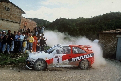 Carlos Sainz Cenamor - Luís Moya
38º Rallye Sanremo - Rallye d'Italia 1996. Ford Escort RS Cosworth (N5 FMC). Clasificado 2º.

Del 13 al 16 de Octubre, Sanremo, Liguria, Imperia, Italia.
Superficie: asfalto - tierra.

El Rally tenia un total de 1958.12 km de los que 413.32 km divididos en 18 tramos eran especiales (una de ellas fue cancelada SS1 Nerbisci 1 de 32.17 Km a causa del fuerte accidente de Tommi Mäkinen - Seppo Harjanne del que por suerte salieron ilesos).

Tomaron la salida 108 equipos, finalizaron 47.@
Palabras clave: ;Luis_Moya;Ford;Escort;Cosworth;Sanremo;1996