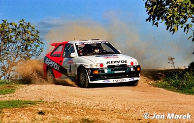 Carlos Sainz Cenamor - Luís Moya
38º Rallye Sanremo - Rallye d'Italia 1996. Ford Escort RS Cosworth (N5 FMC). Clasificado 2º.

Del 13 al 16 de Octubre, Sanremo, Liguria, Imperia, Italia.
Superficie: asfalto - tierra.

El Rally tenia un total de 1958.12 km de los que 413.32 km divididos en 18 tramos eran especiales (una de ellas fue cancelada SS1 Nerbisci 1 de 32.17 Km a causa del fuerte accidente de Tommi Mäkinen - Seppo Harjanne del que por suerte salieron ilesos).

Tomaron la salida 108 equipos, finalizaron 47.

© Jan Marek
@
Palabras clave: ;Luis_Moya;Ford;Escort;Cosworth;Sanremo;1996