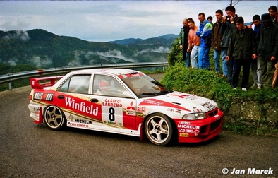 Didier Auriol - Denis Giraudet
38º Rallye Sanremo - Rallye d'Italia 1996. Mitsubishi Lancer EvoIII (M7 MRE). Clasificado 8º.

Del 13 al 16 de Octubre, Sanremo, Liguria, Imperia, Italia.
Superficie: asfalto - tierra.

El Rally tenia un total de 1958.12 km de los que 413.32 km divididos en 18 tramos eran especiales (una de ellas fue cancelada SS1 Nerbisci 1 de 32.17 Km a causa del fuerte accidente de Tommi Mäkinen - Seppo Harjanne del que por suerte salieron ilesos).

Tomaron la salida 108 equipos, finalizaron 47.

© Jan Marek
@
Palabras clave: Didier_Auriol;Mitsubishi;Lancer;Sanremo;1996