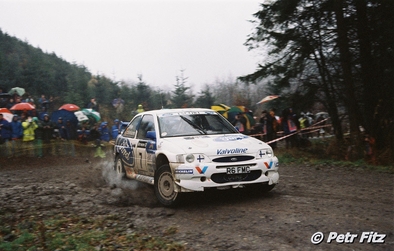 Juha Kankkunen - Juha Repo
54º Network Q Rally de Gran Bretaña 1998. Ford Escort WRC (R6 FMC). Clasificado 2º.

Del 22 al 24 de Noviembre, Cheltenham, Inglaterra.
Superficie: tierra - asfalto.

El Rally tenia un total de 1175.90 km de los que 383.85 km divididos en 28 tramos eran especiales.

Tomaron la salida 168 equipos, finalizaron 82.

© Petr Fitz
@@
Palabras clave: ;Ford;Escort;WRC;Gran_Bretaña;1998;Inglaterra