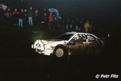 Bruno Thiry - Stéphane Prévot
54º Network Q Rally de Gran Bretaña 1998. Ford Escort WRC (P9 FMC). Clasificado 3º.

Del 22 al 24 de Noviembre, Cheltenham, Inglaterra.
Superficie: tierra - asfalto.

El Rally tenia un total de 1175.90 km de los que 383.85 km divididos en 28 tramos eran especiales.

Tomaron la salida 168 equipos, finalizaron 82.

© Petr Fitz
@
Palabras clave: Bruno_Thiry;Ford;Escort;WRC;Gran_Bretaña;1998;Inglaterra