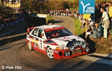 Richard Burns - Robert Reid
40º Rallye Sanremo - Rallye d'Italia 1998. Mitsubishi Carisma GT Evo V (R2 MRE). Clasificado 7º.

Del 12 al 14 Octubre, Sanremo, Imperia, Liguria, Italia.
Superficie: asfalto.

El Rally tenia un total de 1494.80 Km de los que 400.30 km divididos en 24 tramos eran especiales.

Se inscribieron 160 equipos, tomaron la salida 153, finalizaron 76.

© Petr Fitz.
@
Palabras clave: Richard_Burns;Mitsubishi;Carisma;Evo_V;Sanremo;1998