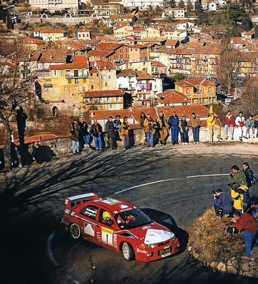 Tommi Mäkinen - Risto Mannisenmaki
67º Rallye Automobile de Monte-Carlo 1999. Mitsubishi Lancer Evo VI (S2 TMR). Clasificado 1º.

Del 17 al 20 de Enero, Monte-Carlo.
Superficie: asfalto - nieve.

El Rally tenia un total de 1613.7 km de los que 424.6 km divididos en 14 tramos eran especiales.

Tomaron la salida 86 equipos, finalizaron 46.@
Palabras clave: ;Mitsubishi;Lancer;Evo;VI;Montecarlo;1999