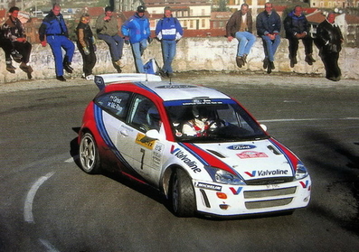 Colin McRae - Nicky Grist
67º Rallye Automobile de Monte-Carlo 1999. Ford Focus RS WRC '99 (S7 FMC).
Quedó 3º, pero una vez finalizado el Rallye fue descalificado por considerarse que la bomba de agua era ilegal.

Del 17 al 20 de Enero, Monte-Carlo.
Superficie: asfalto - Nieve.

El Rally tenia un total de 1613.20 km de los que 424.69 km divididos en 14 tramos eran especiales.

Tomaron la salida 86 equipos, finalizaron 46.@
Palabras clave: ;Ford;Focus;WRC;Montecarlo;1999