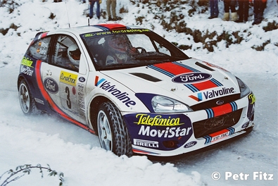 Carlos Sainz Cenamor - Luis Moya
69º Rallye Automobile de Monte-Carlo 2001. Ford Focus WRC '01 (V10 FMC). Clasificado 2º.

Del 18 al 21 de Enero, Mónaco.
Superficie: asfalto - nieve.

El Rally tenia un total de 1738.81 km de los que 392.18 km divididos en 15 tramos eran especiales, (una de ellas fue cancelada SS10 Comps 2 de 20.53 Km).

Se inscribieron 60 equipos, tomaron la salida 56, finalizaron 27.

© Petr Fitz
@@
Palabras clave: ;Ford;Focus;Montecarlo;2001;Nieve
