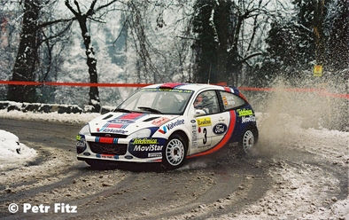 Carlos Sainz Cenamor - Luis Moya
69º Rallye Automobile de Monte-Carlo 2001. Ford Focus WRC '01 (V10 FMC). Clasificado 2º.

Del 18 al 21 de Enero, Mónaco.
Superficie: asfalto - nieve.

El Rally tenia un total de 1738.81 km de los que 392.18 km divididos en 15 tramos eran especiales, (una de ellas fue cancelada SS10 Comps 2 de 20.53 Km).

Se inscribieron 60 equipos, tomaron la salida 56, finalizaron 27.

© Petr Fitz
@@
Palabras clave: ;Ford;Focus;Montecarlo;2001;Nieve